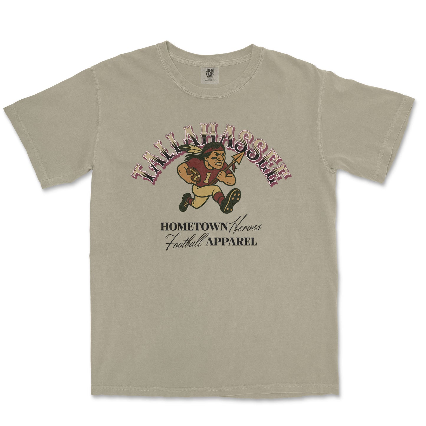 Beige t-shirt with football-themed graphic and text on a white background