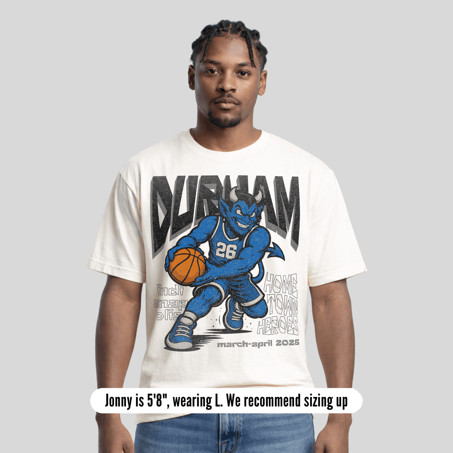 Man wearing a 'Durham' t-shirt with a graphic design on a gray background