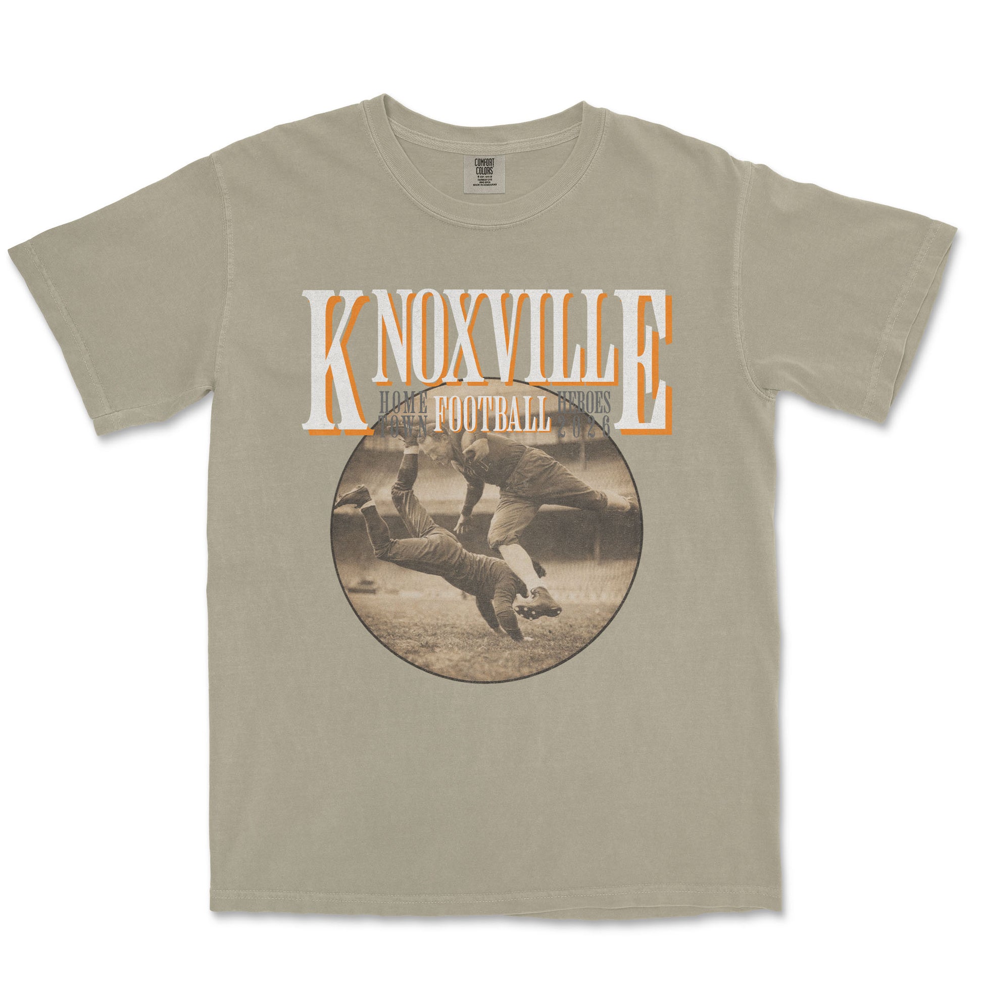 Beige t-shirt with 'Knoxville Football' graphic on a white background