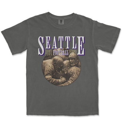 Gray t-shirt with 'Seattle' and football graphic on a white background