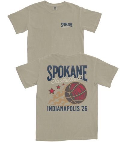 Beige t-shirt with 'Spokane' text and sports graphics on a white background