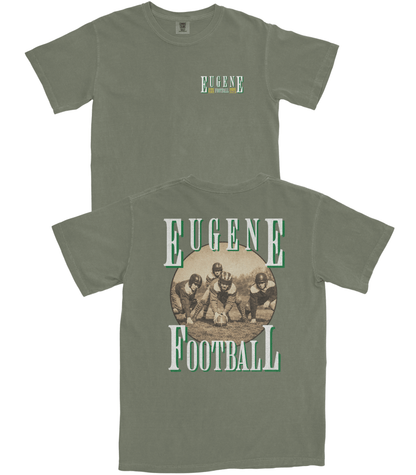 Two green t-shirts with 'Eugene' and 'Football' text on a white background