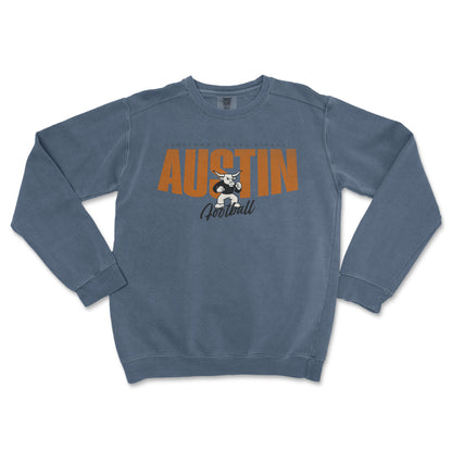 Blue sweatshirt with 'AUSTIN Football' text and graphic on a white background