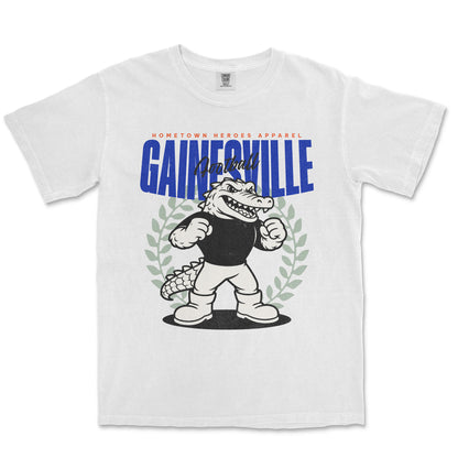 White t-shirt with cartoon alligator graphic and 'Gainesville' text on a white background