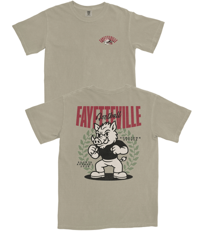 Beige t-shirt with graphic design and text on a white background