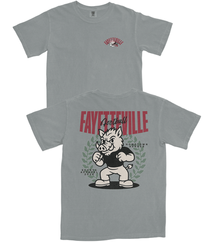 Gray t-shirt with graphic design and text on a white background
