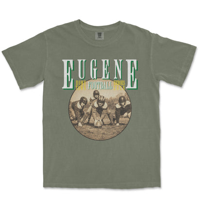 Green t-shirt with 'Eugene Football' graphic on a white background