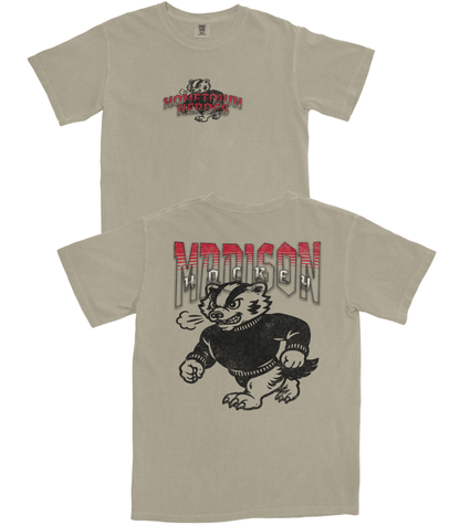 Beige t-shirt with graphic design of a badger and text on a white background