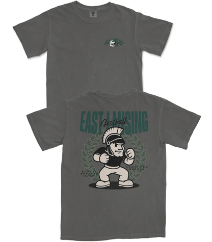 Gray t-shirt with a cartoon character and 'East Lansing' text on a white background