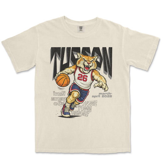 Beige t-shirt with a tiger graphic holding a basketball and text on a white background