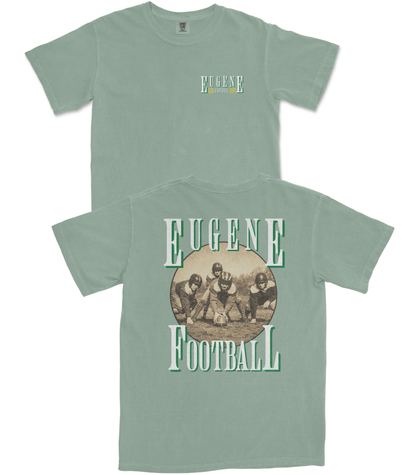 Green t-shirt with 'Eugene Football' design on a white background