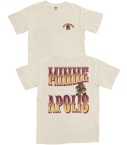 Beige t-shirt with 'Minneapolis' text and bear graphic on a white background