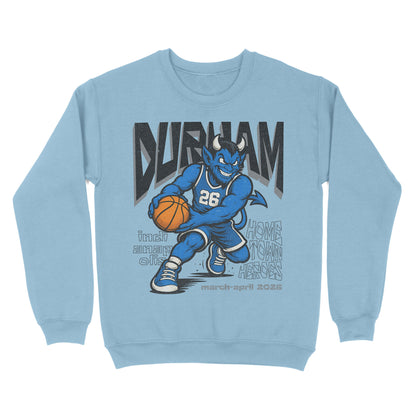 Light blue sweatshirt with a cartoon bull holding a basketball and text on a white background