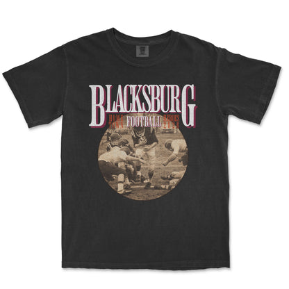 Black t-shirt with 'Blacksburg Football' graphic and vintage-style photo of a football game.