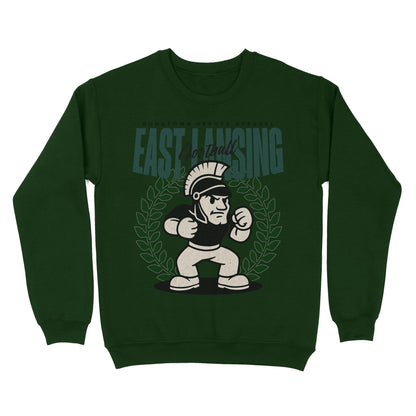 Green sweatshirt with a graphic design of a cartoon character and 'East Lansing' text on a white background