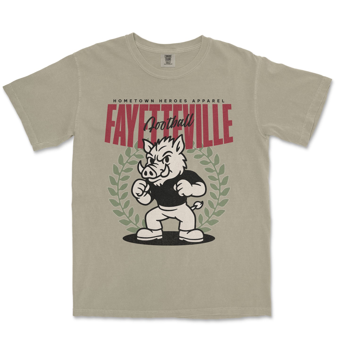 Beige t-shirt with a graphic of a boar and text 'Fayetteville Football' on a white background