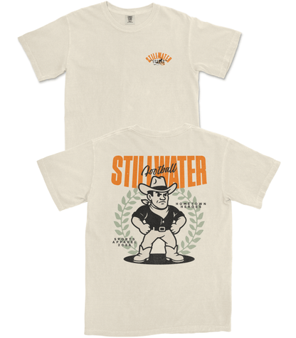Beige t-shirt with a graphic design of a cowboy and text on a white background