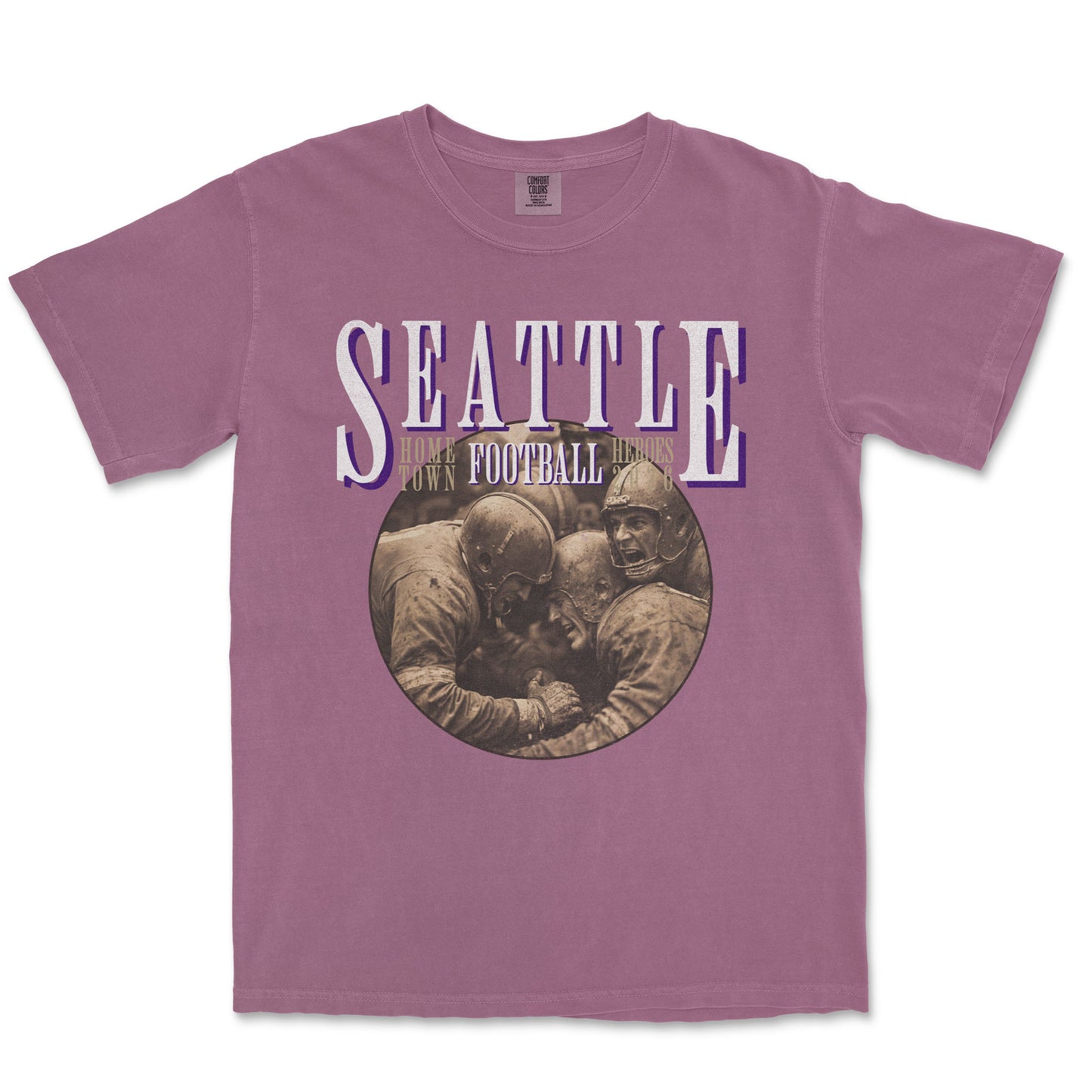 Purple t-shirt with 'Seattle Football' graphic on a white background