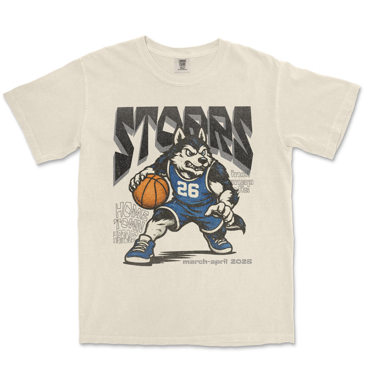 Beige t-shirt with a graphic of a dog holding a basketball and text on a white background