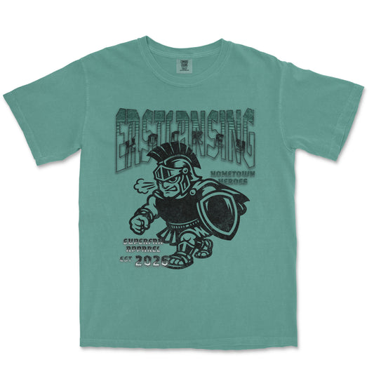 Teal t-shirt with graphic design of a warrior and text on a white background
