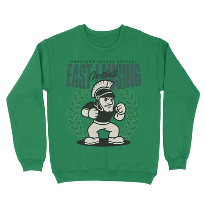 Green sweatshirt with a graphic design of a football player and text on a white background
