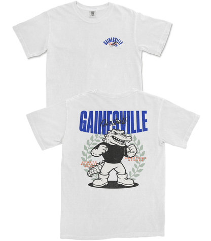 Two white t-shirts with cartoon character and 'Gainesville' text on a white background
