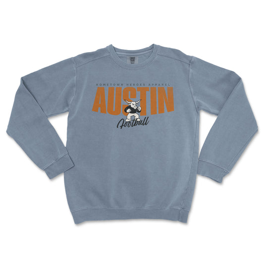 Blue sweatshirt with 'Austin Football' text and graphic on a white background