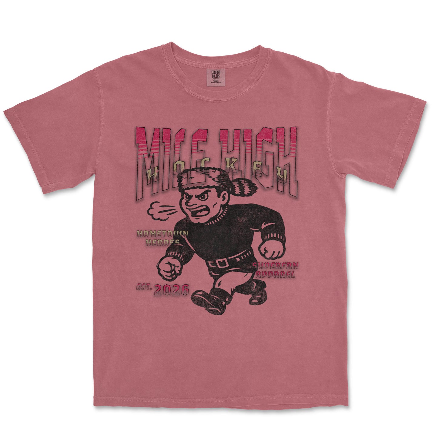 Pink t-shirt with a graphic design of a cartoon character and text on a white background