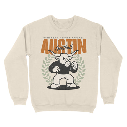 Beige sweatshirt with a graphic of a bull and text on a white background