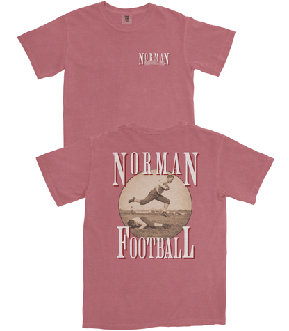 Red t-shirt with 'Norman Football' graphic on a white background