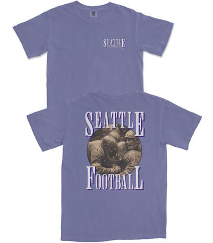 Purple t-shirt with 'Seattle Football' graphic on a white background