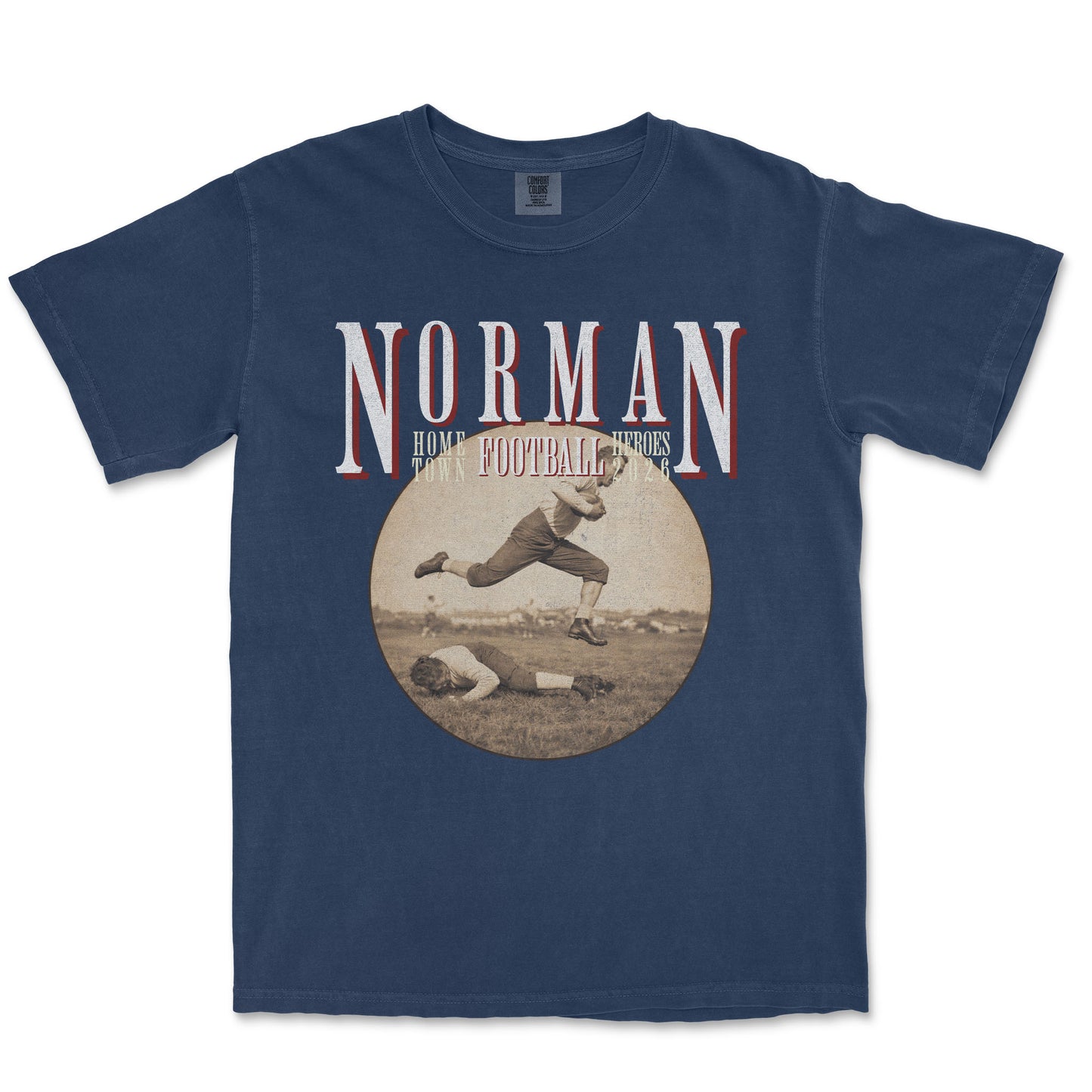 Navy blue t-shirt with vintage football graphic and 'Norman' text on a white background