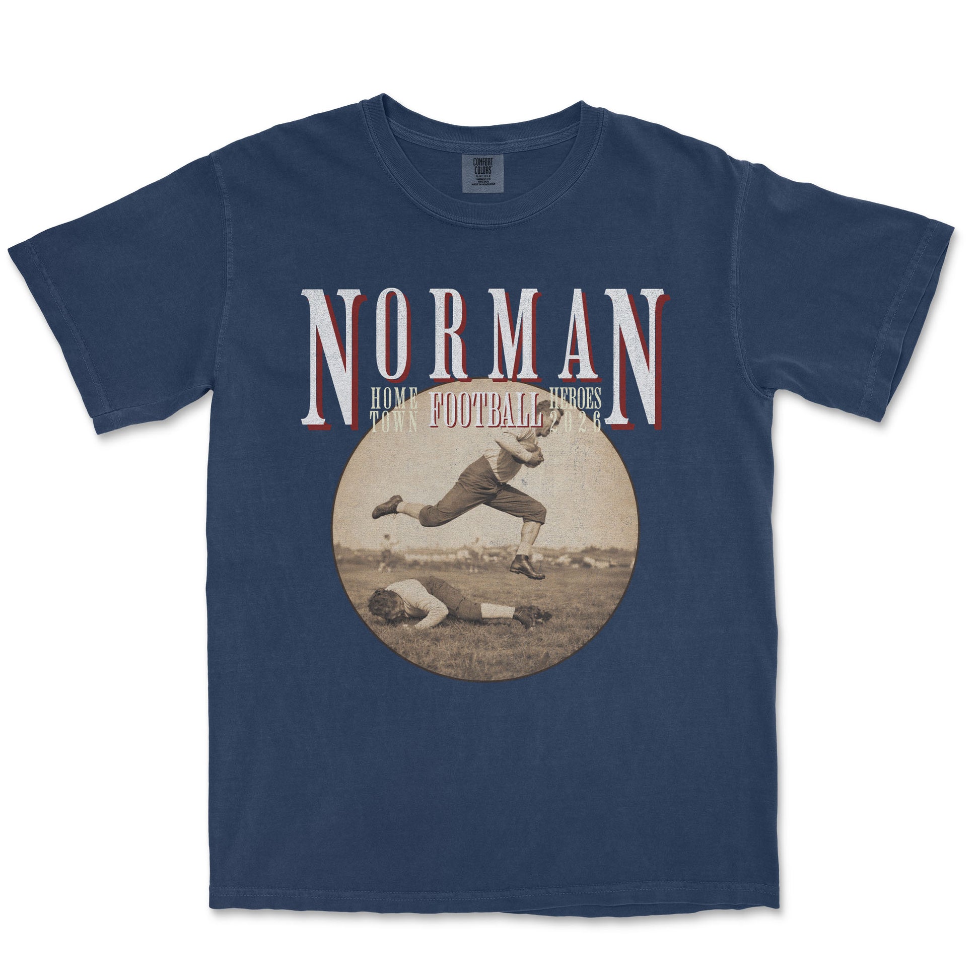 Navy blue t-shirt with vintage football graphic and 'Norman' text on a white background