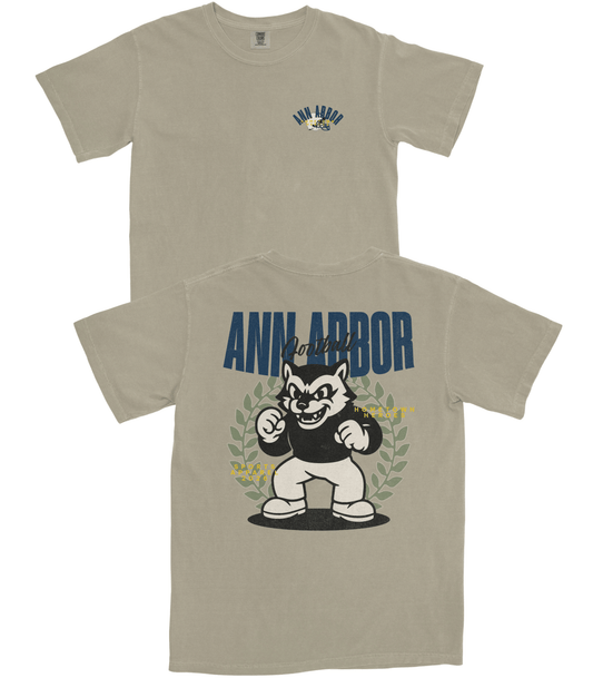 Beige t-shirt with 'Ann Arbor' and bear graphic on a white background