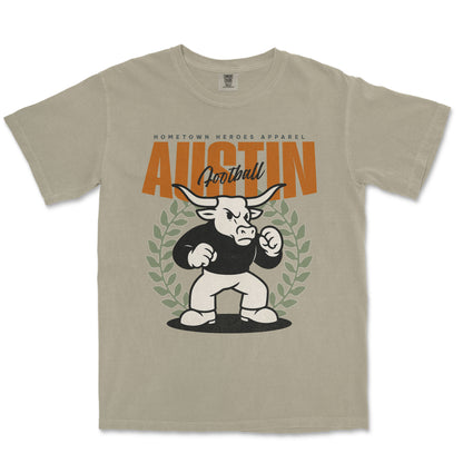 Beige t-shirt with a graphic of a bull and text on a white background