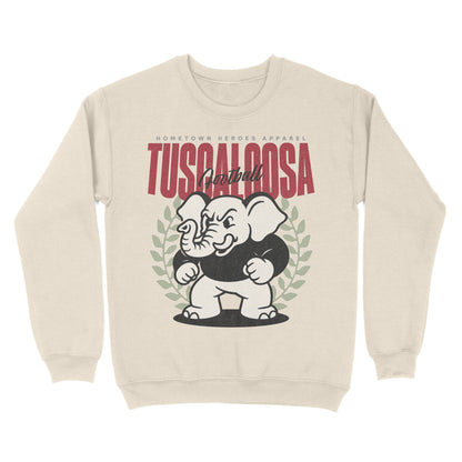 Beige sweatshirt with an elephant graphic and text on a white background