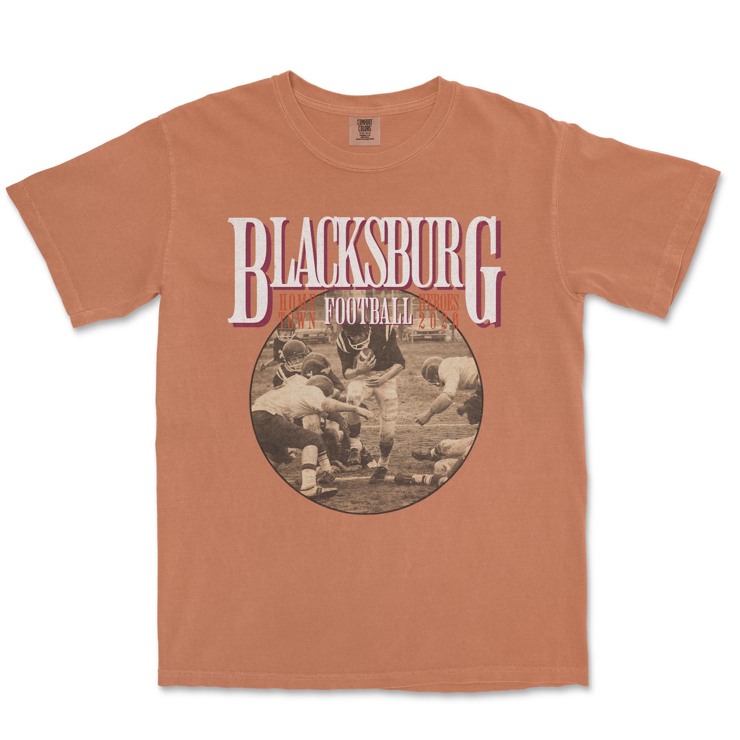 Brown t-shirt with 'Blacksburg Football' graphic on a white background
