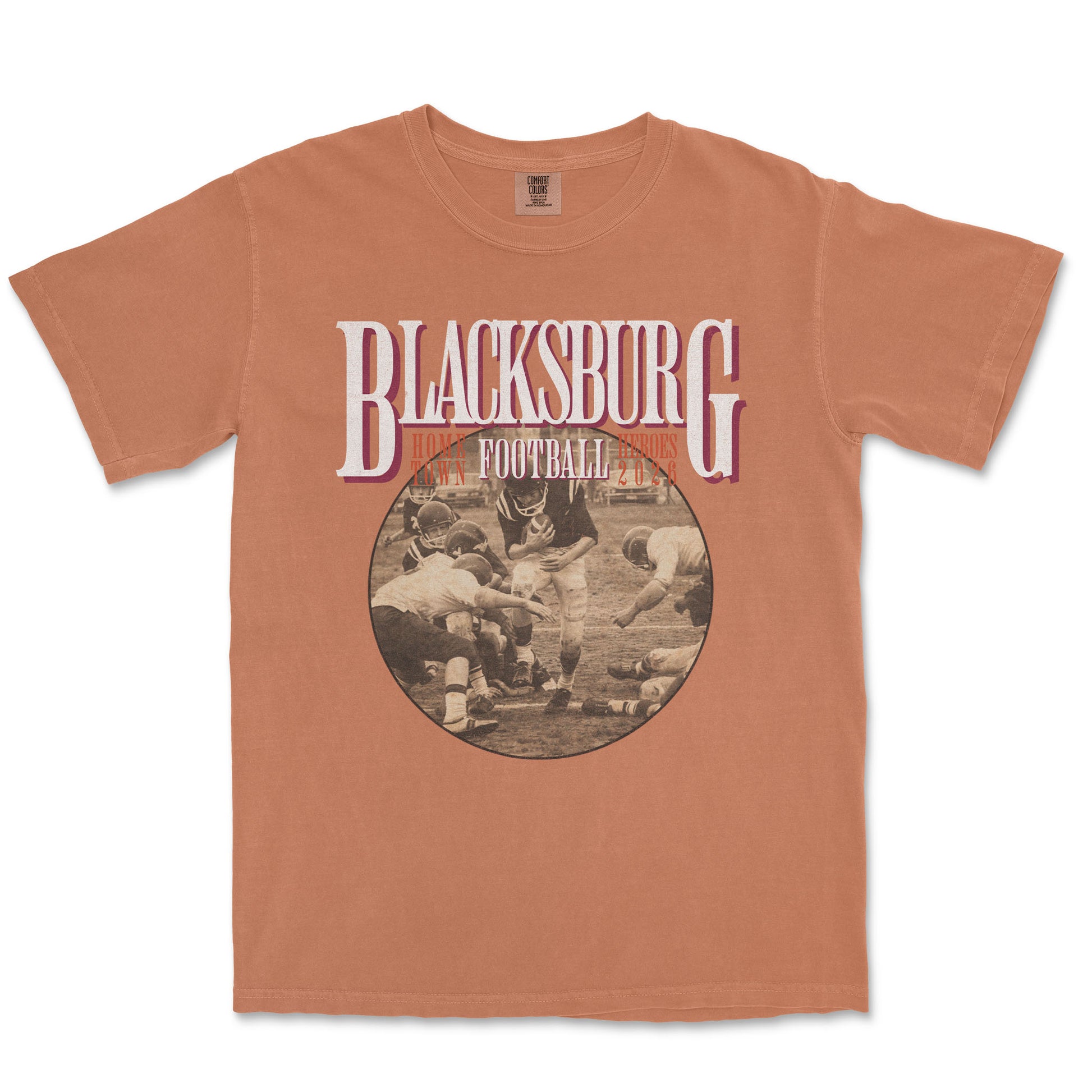 Brown t-shirt with 'Blacksburg Football' graphic on a white background