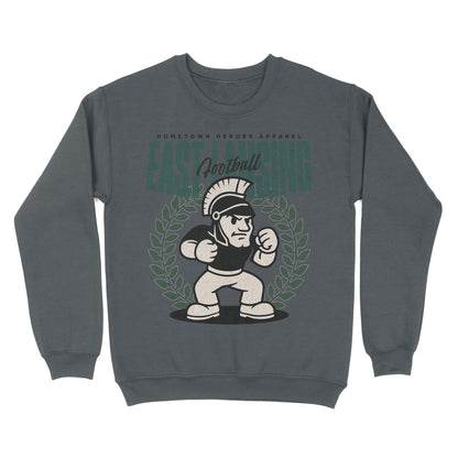 Gray sweatshirt with a graphic design of a football player and laurel wreath on a white background