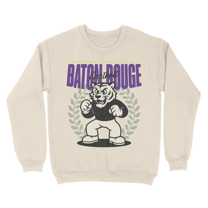Beige sweatshirt with a graphic of a tiger and text 'Batch Rougé' on a white background