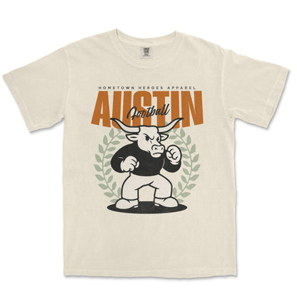 Beige t-shirt with a graphic of a bull and text on a white background