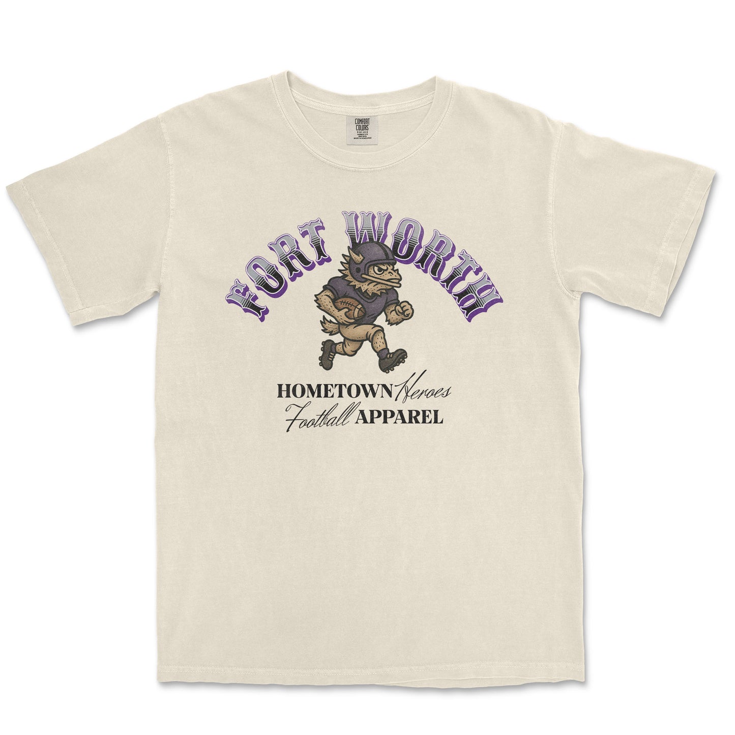 Beige t-shirt with 'Fort Worth Hometown Heroes Football Apparel' graphic on a white background