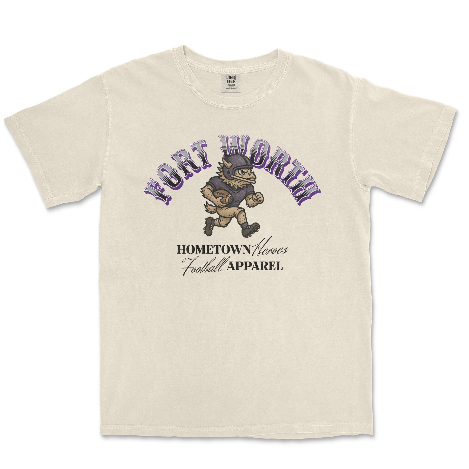 Beige t-shirt with 'Fort Worth Hometown Heroes Football Apparel' graphic on a white background