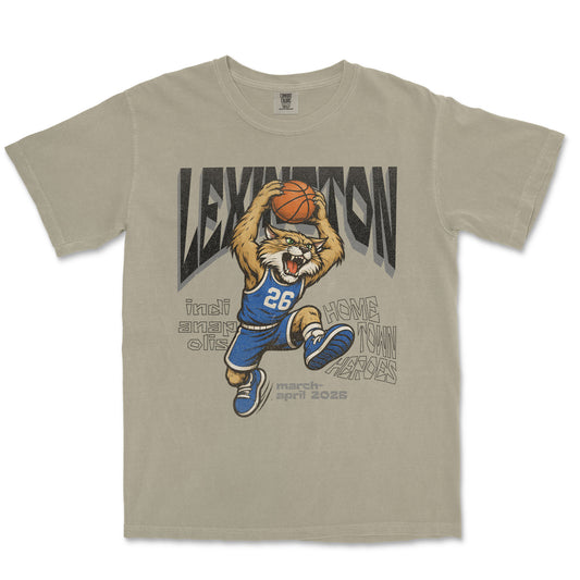 Beige t-shirt with a graphic of a lion playing basketball and text on a white background