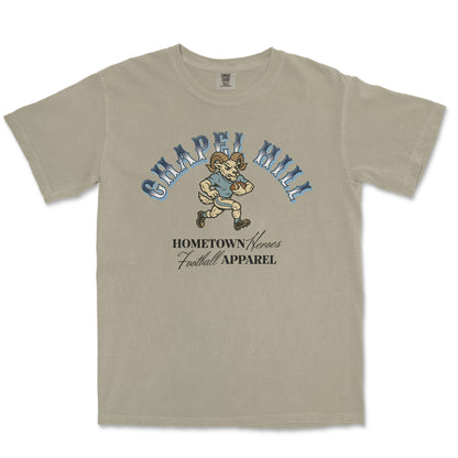 Beige t-shirt with 'Chapel Hill' graphic design on a white background