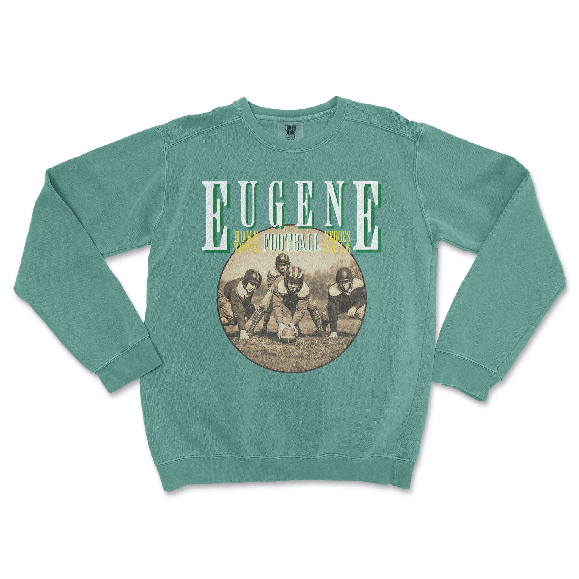 Teal sweatshirt with vintage football graphic and 'Eugene' text on a white background