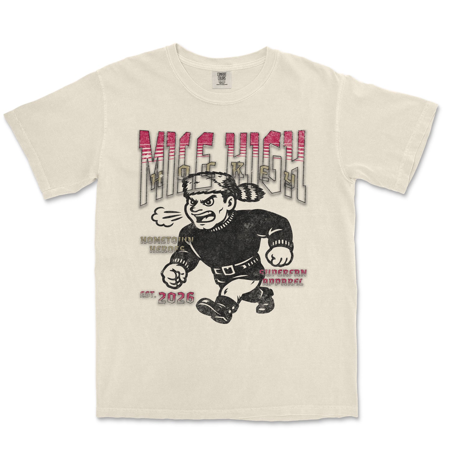 Beige t-shirt with graphic design of a character and text on a white background