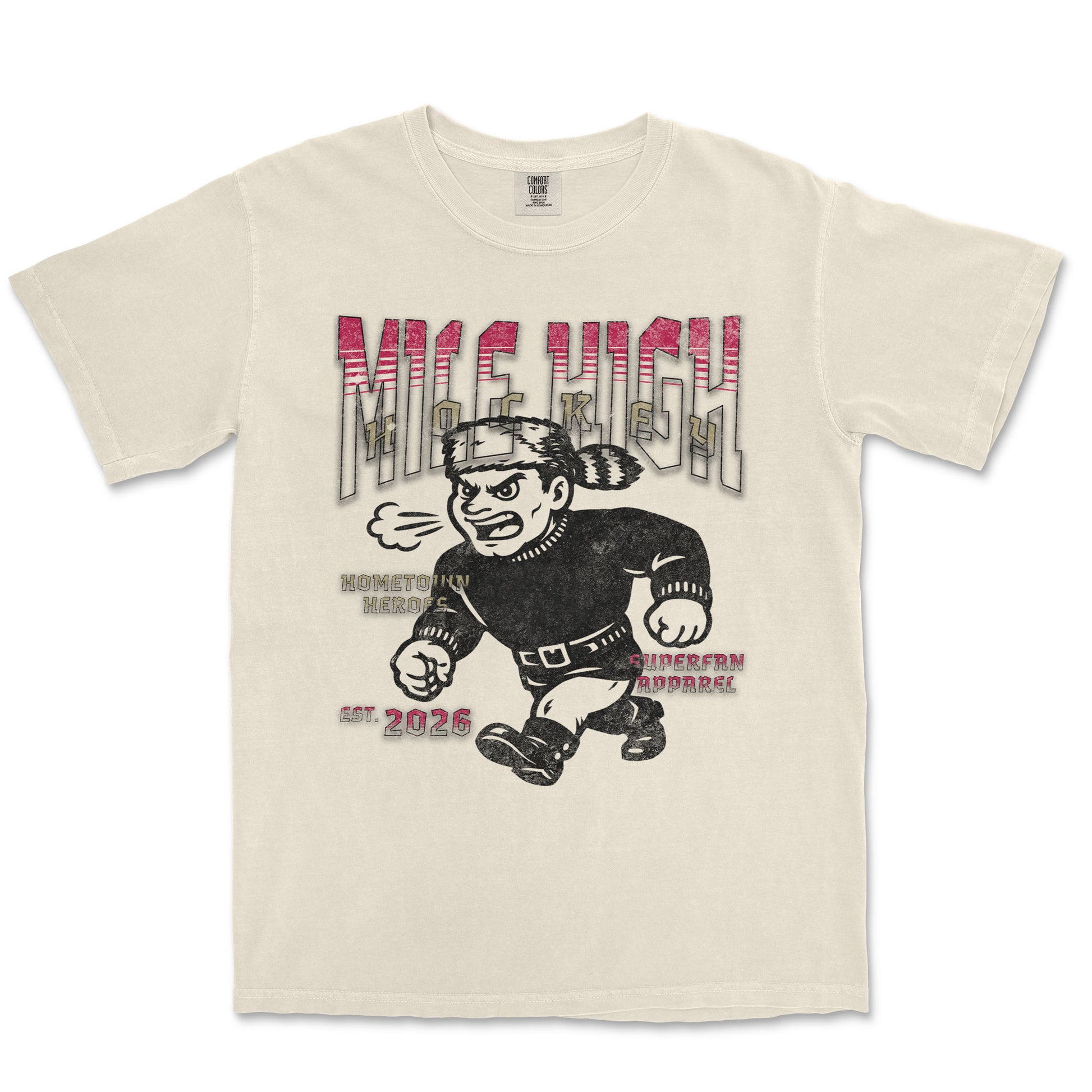Beige t-shirt with graphic design of a character and text on a white background