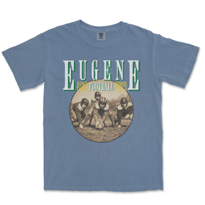 Blue t-shirt with 'Eugene Football' graphic on a white background
