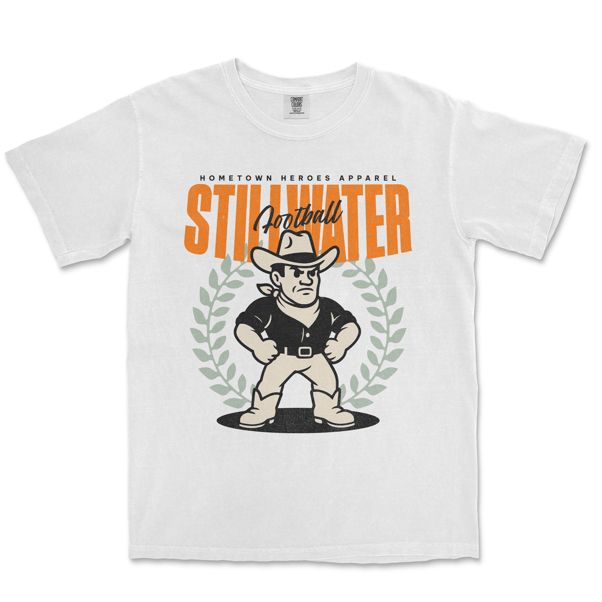 White t-shirt with a graphic of a cartoon cowboy and 'Stillwater' text on a white background